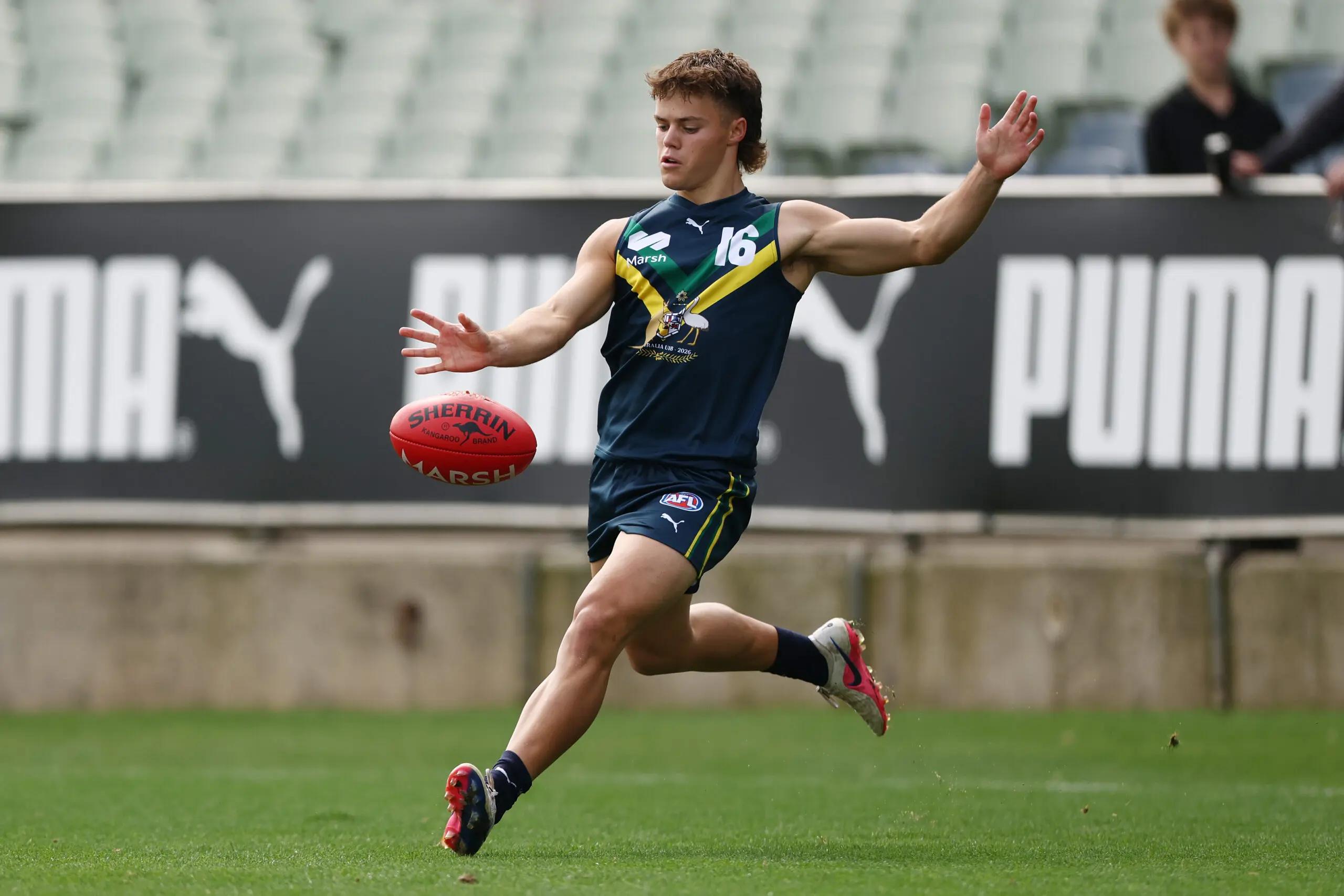 MELBOURNE, AUSTRALIA - APRIL 18: Marlon Neocleous of the AFL National Academy kicks the ball during the Marsh AFL National Academy Boys match between Australia U18 and Richmond VFL at Ikon Park on April 18, 2026 in Melbourne, Australia. (Photo by Morgan Hancock/AFL Photos/via Getty Images)