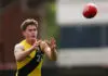 MELBOURNE, AUSTRALIA - APRIL 18: Sam Cumming of the Tigers marks the ball during the Marsh AFL National Academy Boys match between Australia U18 and Richmond VFL at Ikon Park on April 18, 2026 in Melbourne, Australia. (Photo by Morgan Hancock/AFL Photos/via Getty Images)