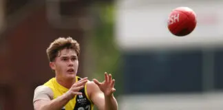 “Keep giving him that exposure”: Richmond coach on midfield mix MELBOURNE, AUSTRALIA - APRIL 18: Sam Cumming of the Tigers marks the ball during the Marsh AFL National Academy Boys match between Australia U18 and Richmond VFL at Ikon Park on April 18, 2026 in Melbourne, Australia. (Photo by Morgan Hancock/AFL Photos/via Getty Images)
