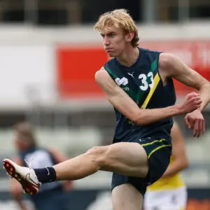 MELBOURNE, AUSTRALIA - APRIL 18: Xavier Ladbrook of the AFL National Academy kicks the ball during the Marsh AFL National Academy Boys match between Australia U18 and Richmond VFL at Ikon Park on April 18, 2026 in Melbourne, Australia. (Photo by Morgan Hancock/AFL Photos/via Getty Images)
