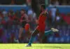 GOLD COAST, AUSTRALIA - APRIL 18: Touk Miller of the Suns kicks during the round six AFL match between Gold Coast Suns and Essendon Bombers at People First Stadium, on April 18, 2026, in Gold Coast, Australia. (Photo by Chris Hyde/Getty Images)