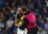 MELBOURNE, AUSTRALIA - APRIL 19: Sam Banks of the Tigers reacts to an injury during the round six AFL match between North Melbourne Kangaroos and Richmond Tigers at Marvel Stadium, on April 19, 2026, in Melbourne, Australia. (Photo by Morgan Hancock/Getty Images)