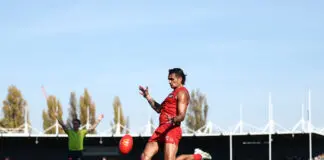 “Can we just simplify it?”: Hardwick pleads for clarity in new AFL rule LAUNCESTON, AUSTRALIA - APRIL 25: Jamarra Ugle-Hagan of the Suns kicks the ball during the 2026 AFL Round 07 match between the Hawthorn Hawks and the Gold Coast Suns at UTAS Stadium on April 25, 2026 in Launceston, Australia. (Photo by James Wiltshire/AFL Photos via Getty Images)