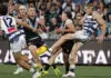 ADELAIDE, AUSTRALIA - APRIL 25: Mark Blicavs of the Cats is tackled by Zak Butters of the Power during the 2026 AFL Round 07 match between the Port Adelaide Power and the Geelong Cats at Adelaide Oval on April 25, 2026 in Adelaide, Australia. (Photo by James Elsby/AFL Photos via Getty Images)