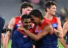 MELBOURNE, AUSTRALIA - APRIL 24: Kysaiah Pickett and Latrelle Pickett of the Demons celebrate winning the round seven AFL match between Richmond Tigers and Melbourne Demons at Melbourne Cricket Ground, on April 24, 2026, in Melbourne, Australia. (Photo by Quinn Rooney/Getty Images)