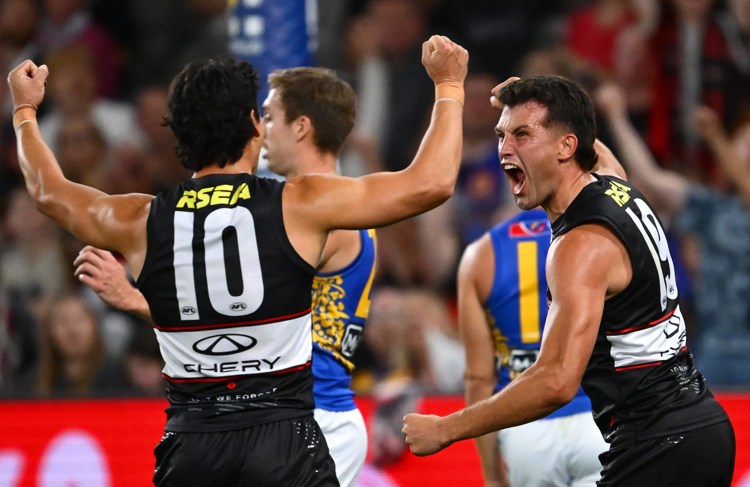 MELBOURNE, AUSTRALIA - APRIL 26: Rowan Marshall of the Saints is congratulated by team mates after kicking a goal during the round seven AFL match between St Kilda Saints and West Coast Eagles at Marvel Stadium, on April 26, 2026, in Melbourne, Australia. (Photo by Quinn Rooney/Getty Images)