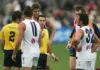 “He’s come back and there’s mayhem”: AFL umpire clarifies infamous “Sirengate” LAUNCESTON, TAS - APRIL 30: Umpire Hayden Kennedy talks to Fremantle players about not hearing the final siren after the round five AFL match between the St Kilda Saints and the Fremantle Dockers at Aurora Stadium April 30, 2006 in Launceston, Australia. (Photo by Sean Garnsworthy/Getty Images)