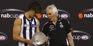 “Scared” and “thankful”: Pendlebury on the impact of two Collingwood cultural lynchpins MELBOURNE, AUSTRALIA - MARCH 11: Scott Pendlebury and Mick Malthouse the coach of the Magpies look at the trophy after winning the NAB Cup AFL Grand Final match between the Essendong Bombers and the Collingwood Magpies at Etihad Stadium on March 11, 2011 in Melbourne, Australia. (Photo by Quinn Rooney/Getty Images)