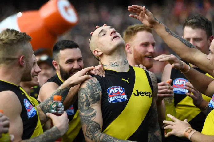 MELBOURNE, AUSTRALIA - SEPTEMBER 28: Dustin Martin of the Tigers reacts to being named the Norm Smith winner during the 2019 Toyota AFL Grand Final match between the Richmond Tigers and the GWS Giants at the Melbourne Cricket Ground on September 28, 2019 in Melbourne, Australia. (Photo by Daniel Carson/AFL Photos via Getty Images)