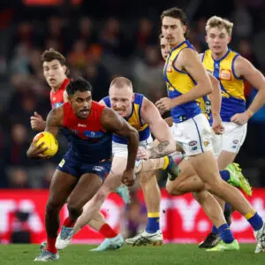 MELBOURNE, AUSTRALIA - AUGUST 02: Kysaiah Pickett of the Demons is chased by Bailey J. Williams of the Eagles during the 2025 AFL Round 21 match between the Melbourne Demons and the West Coast Eagles at Marvel Stadium on August 2, 2025 in Melbourne, Australia. (Photo by Michael Willson/AFL Photos via Getty Images)