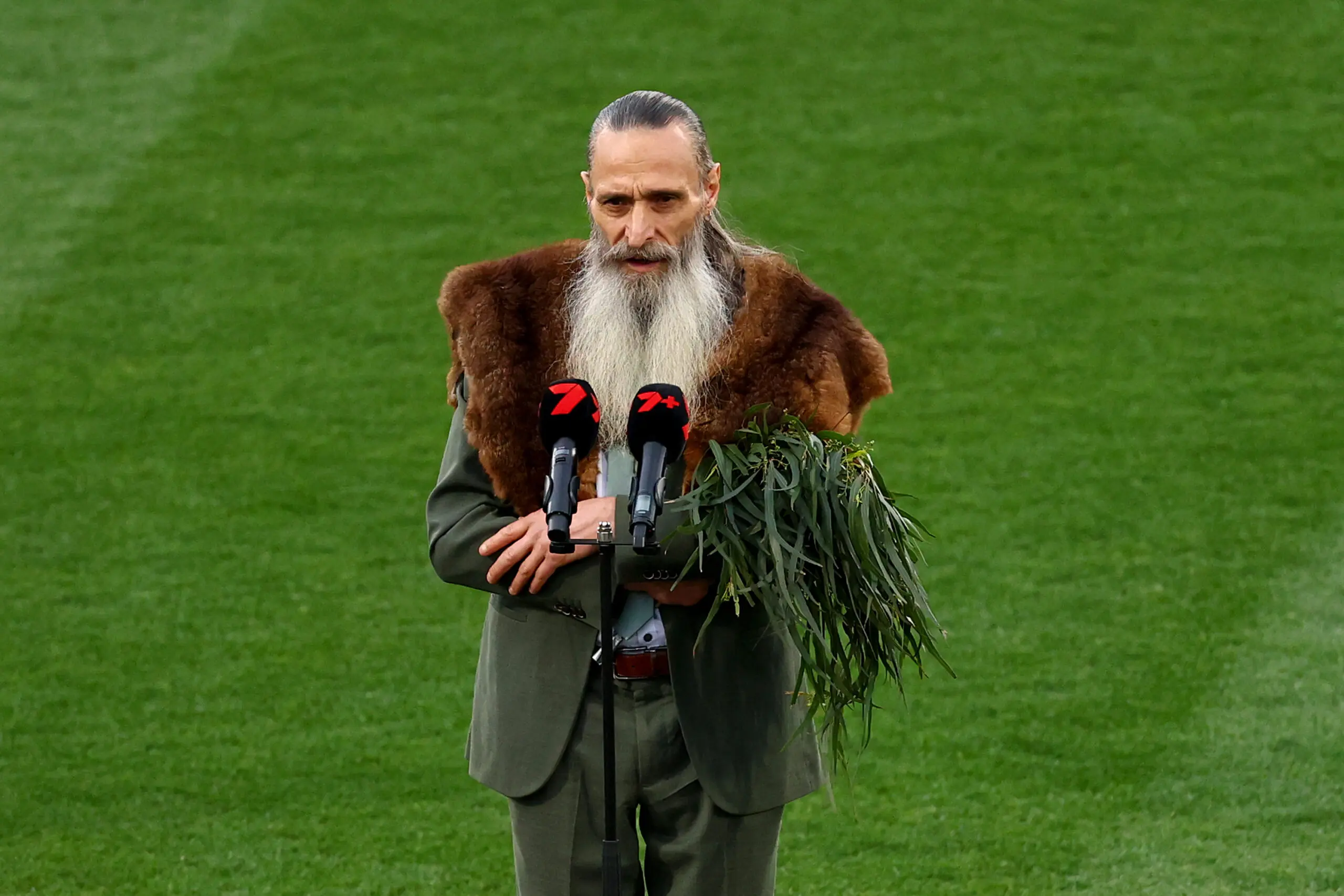 MELBOURNE, AUSTRALIA - NOVEMBER 29: Wurundjeri Elder, Uncle Colin Hunter Jnr delivers a Welcome to Country during the AFLW Grand Final match between North Melbourne Kangaroos and Brisbane Lions at Ikon Park on November 29, 2025 in Melbourne, Australia. (Photo by Josh Chadwick/AFL Photos/via Getty Images)