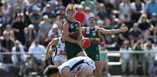 Top Mid-Season Draft pickup to get his chance for Essendon HOBART, AUSTRALIA - MARCH 21: Jaxon Artemis of the Devils in action during the round one VFL match between Tasmania Devils and Coburg Lions at North Hobart Oval on March 21, 2026 in Hobart, Australia. (Photo by Steve Bell/Getty Images)