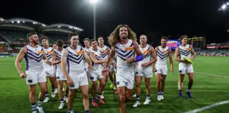 Fremantle coach on star’s health after knee knock, cult hero’s performance ADELAIDE, AUSTRALIA - APRIL 03:The Dockers celebrate as Alex Pearce of the Dockers leads his team off during the round four AFL match between Adelaide Crows and Fremantle Dockers at Adelaide Oval, on April 03, 2026, in Adelaide, Australia. (Photo by Mark Brake/Getty Images)