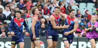 Melbourne sweat on forward’s injury ADELAIDE, AUSTRALIA - APRIL 11: Brody Mihocek of the Demons celebrates a goal with team mates during the 2026 AFL Round 05 match between the Essendon Bombers and the Melbourne Demons at Adelaide Oval on April 11, 2026 in Adelaide, Australia. (Photo by Sarah Reed/AFL Photos via Getty Images)