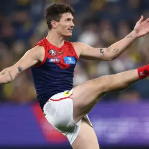 MELBOURNE, AUSTRALIA - APRIL 24: Brody Mihocek of the Demons kicks a goal during the 2026 AFL Round 07 match between the Richmond Tigers and the Melbourne Demons at the Melbourne Cricket Ground on April 24, 2026 in Melbourne, Australia. (Photo by James Wiltshire/AFL Photos via Getty Images)