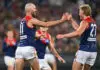 MELBOURNE, AUSTRALIA - APRIL 24: Max Gawn of the Demons is congratulated by Max Heath of the Demons after kicking a goal during the round seven AFL match between Richmond Tigers and Melbourne Demons at Melbourne Cricket Ground, on April 24, 2026, in Melbourne, Australia. (Photo by Quinn Rooney/Getty Images)