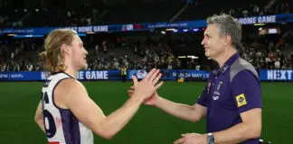 Fremantle’s ‘purple’ lining to star’s latest injury MELBOURNE, AUSTRALIA - MAY 01: Hayden Young and Justin Longmuir, Senior Coach of the Dockers embrace during the 2026 AFL Round 08 match between the Western Bulldogs and the Fremantle Dockers at Marvel Stadium on May 1, 2026 in Melbourne, Australia. (Photo by James Wiltshire/AFL Photos via Getty Images)