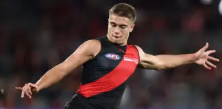AFL MRO: From bad to downright awful for Essendon as monster fine awaits MELBOURNE, AUSTRALIA - MAY 02: Sullivan Robey of the Bombers kicks the ball during the 2026 AFL Round 08 match between the Essendon Bombers and the Brisbane Lions at Marvel Stadium on May 2, 2026 in Melbourne, Australia. (Photo by James Wiltshire/AFL Photos via Getty Images)