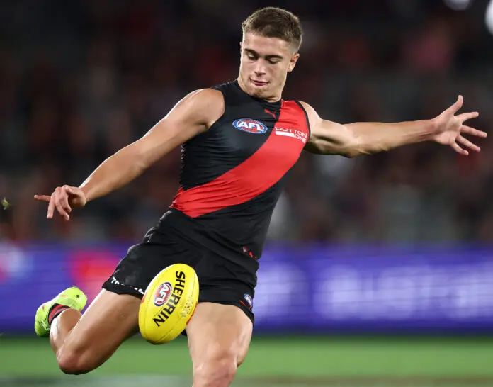 MELBOURNE, AUSTRALIA - MAY 02: Sullivan Robey of the Bombers kicks the ball during the 2026 AFL Round 08 match between the Essendon Bombers and the Brisbane Lions at Marvel Stadium on May 2, 2026 in Melbourne, Australia. (Photo by James Wiltshire/AFL Photos via Getty Images)