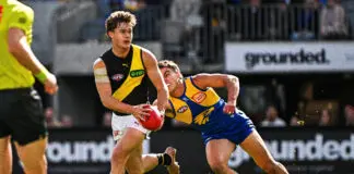‘Has an eye for coaching’: Yze full of praise for veteran Tiger PERTH, AUSTRALIA - MAY 02: Jayden Short of the Tigers is tackled by Elijah Hewett of the Eagles during the 2026 AFL Round 08 match between the West Coast Eagles and the Richmond Tigers at Optus Stadium on May 2, 2026 in Perth, Australia. (Photo by Daniel Carson/AFL Photos via Getty Images)