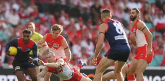 Pickett slowed, but ‘Disco’ stops the Curnow show SYDNEY, AUSTRALIA - MAY 03: Kysaiah Pickett of the Demons evades a tackled by Chad Warner of the Swans during the round eight AFL match between Sydney Swans and Melbourne Demons at Sydney Cricket Ground, on May 03, 2026, in Sydney, Australia. (Photo by Darrian Traynor/Getty Images)