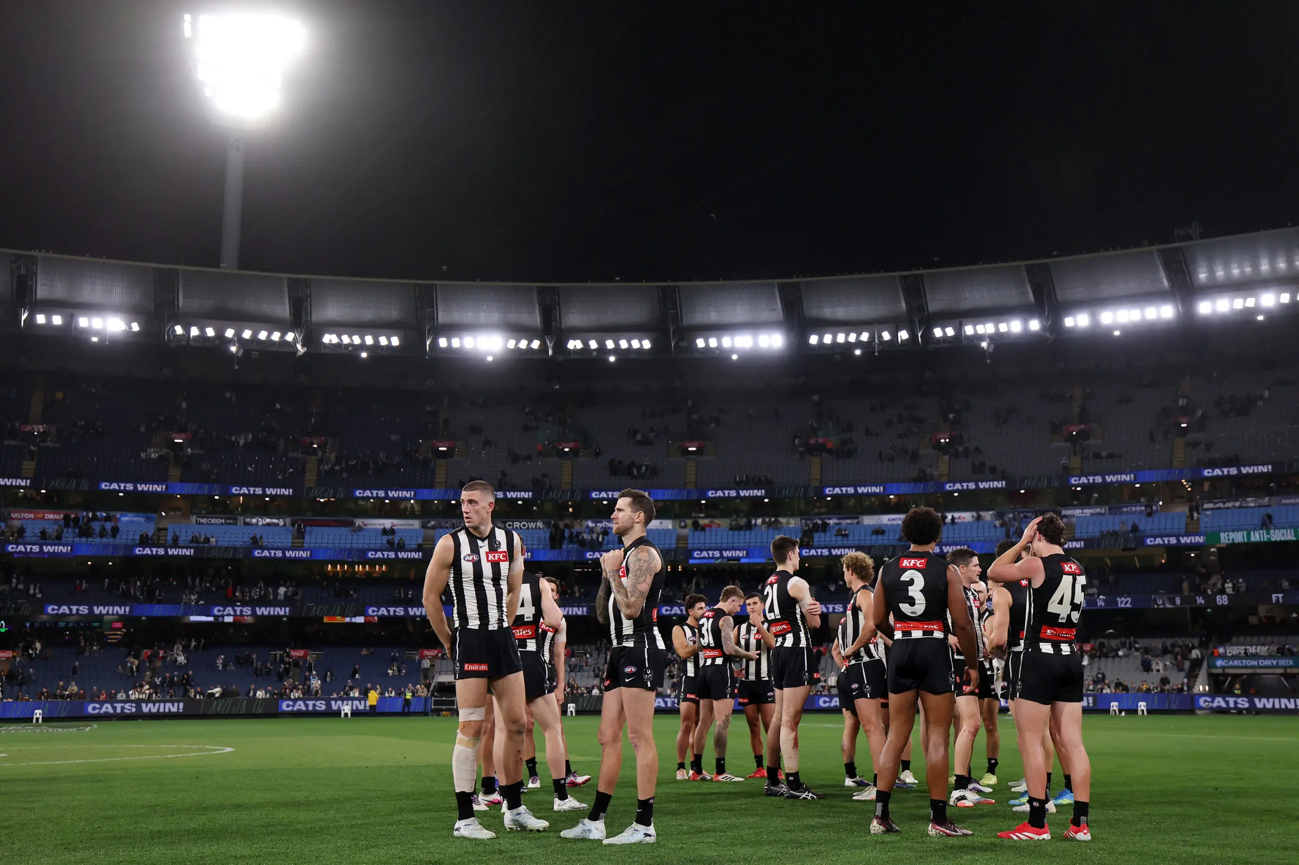 MELBOURNE, AUSTRALIA - MAY 09: Magpies players react following the round nine AFL match between Geelong Cats and Collingwood Magpies at Melbourne Cricket Ground, on May 09, 2026, in Melbourne, Australia. (Photo by Morgan Hancock/AFL Photos/via Getty Images)