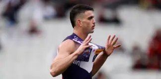 Zippy Docker under a cloud as former Bomber haunts old side MELBOURNE, AUSTRALIA - MAY 17: Patrick Voss of the Dockers celebrates a goal during the 2026 AFL Round 10 match between the Essendon Bombers and Walyalup (Fremantle Dockers) at the Melbourne Cricket Ground on May 17, 2026 in Melbourne, Australia. (Photo by Michael Willson/AFL Photos via Getty Images)