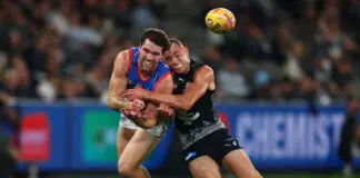 Bulldogs’ injury toll continues to mount with midfielder hamstrung MELBOURNE, AUSTRALIA - MAY 16: Bailey Williams of the Bulldogs handballs under pressure from Will Hayward of the Blues during the round 10 AFL match between Carlton Blues and Western Bulldogs at Marvel Stadium, on May 16, 2026, in Melbourne, Australia. (Photo by Daniel Pockett/AFL Photos/via Getty Images)