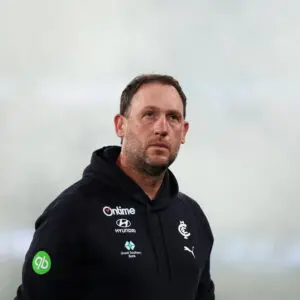 MELBOURNE, AUSTRALIA - MAY 16: Josh Fraser, Interim Coach of the Blues looks on during the round 10 AFL match between Carlton Blues and Western Bulldogs at Marvel Stadium, on May 16, 2026, in Melbourne, Australia. (Photo by Daniel Pockett/AFL Photos/via Getty Images)