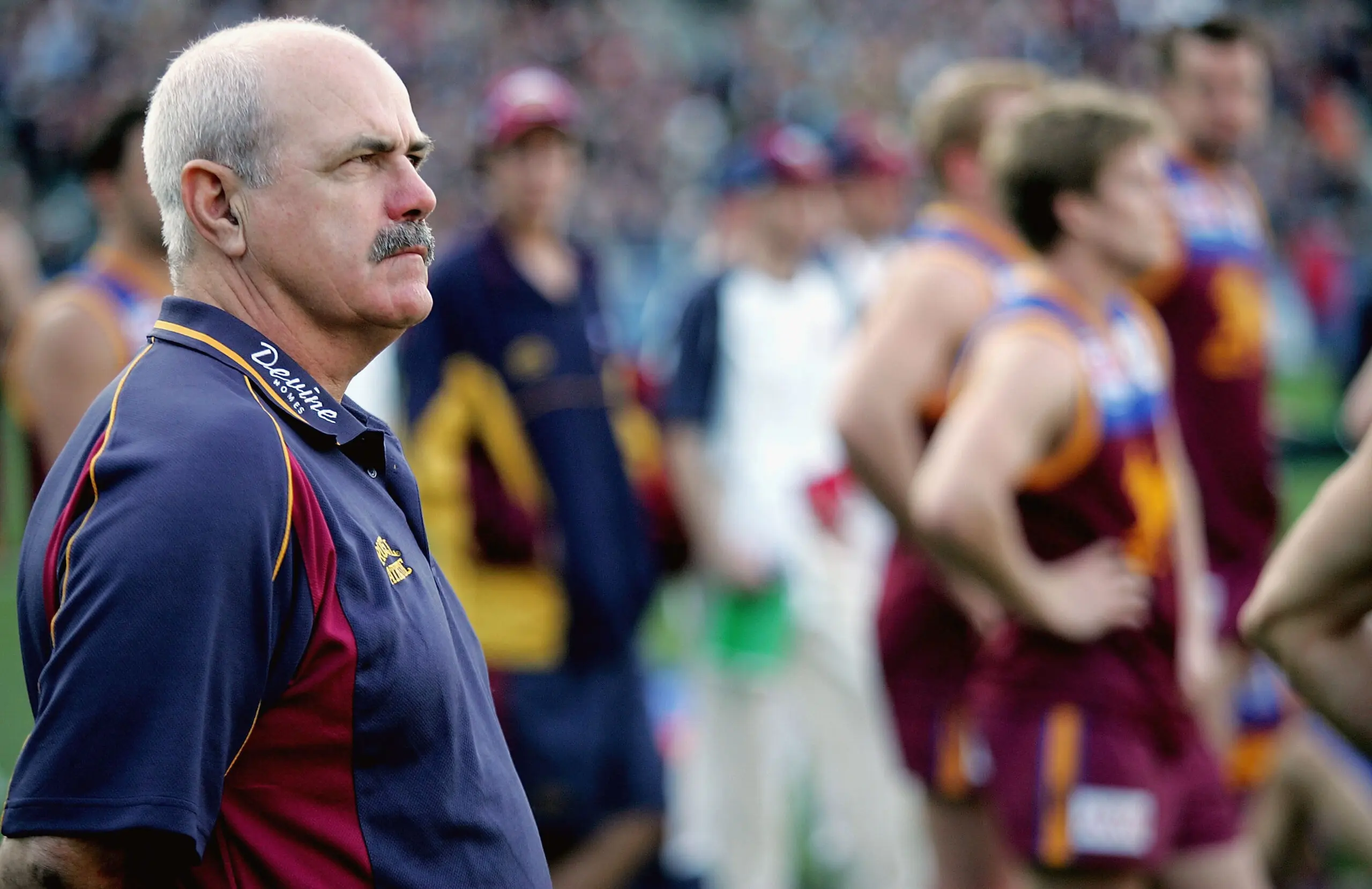MELBOURNE, AUSTRALIA - SEPTEMBER 25: Brisbane coach Leigh Matthews shows his emotions after losing the AFL Grand Final between the Port Adelaide Power and the Brisbane Lions at the Melbourne Cricket Ground September 25, 2004 in Melbourne, Australia. (Photo by Sean Garnsworthy/Getty Images)