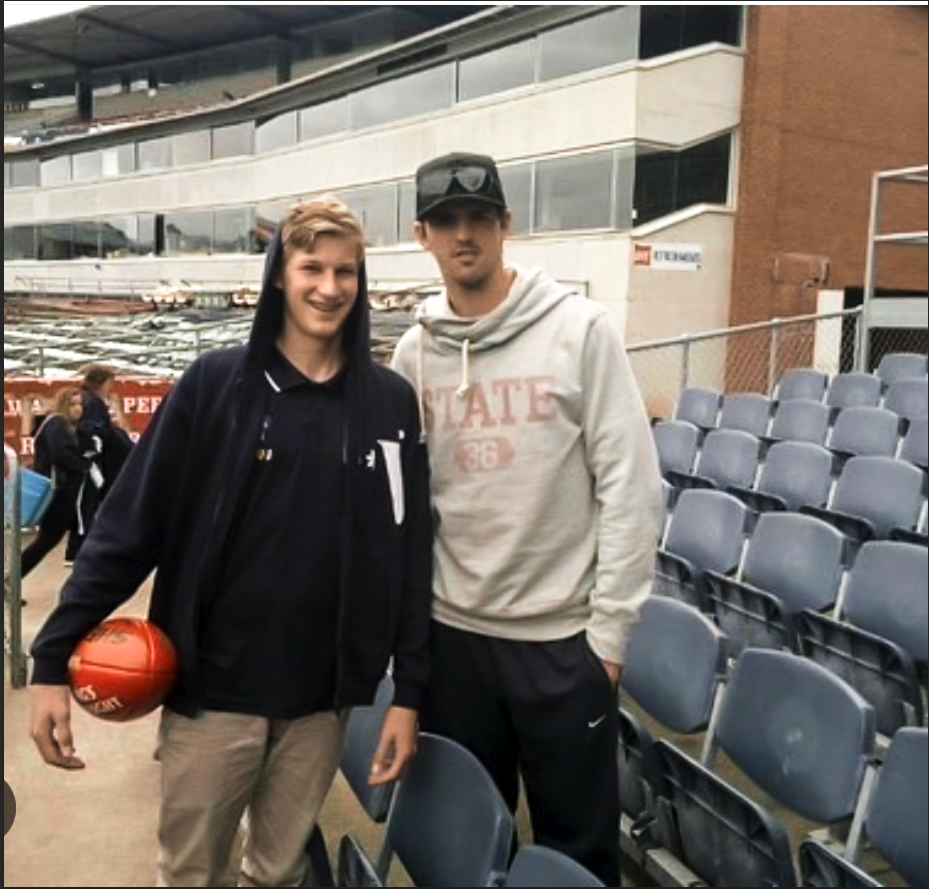 Former Collingwood player and NBL basketballer with Scott Pendlebury.