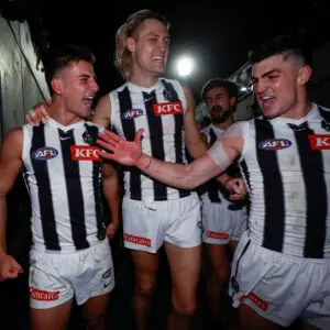 ADELAIDE, AUSTRALIA - SEPTEMBER 04: (L-R) Nick Daicos, Darcy Moore and Brayden Maynard of the Magpies celebrate during the AFL First Qualifying Final match between the Adelaide Crows and the Collingwood Magpies at Adelaide Oval on September 04, 2025 in Adelaide, Australia. (Photo by Michael Willson/AFL Photos via Getty Images)