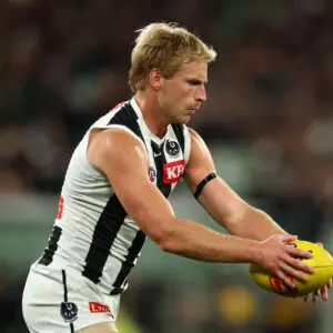 MELBOURNE, AUSTRALIA - APRIL 16: Billy Frampton of the Magpies runs with the ball during the round six AFL match between Carlton Blues and Collingwood Magpies at Melbourne Cricket Ground, on April 16, 2026, in Melbourne, Australia. (Photo by Robert Cianflone/Getty Images)