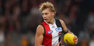 St Kilda youngster viewed as gettable as Saints eye Swan, Bulldog: AFL trade news MELBOURNE, AUSTRALIA - MAY 28: Alix Tauru of the Saints runs with the ball during the round 12 AFL match between St Kilda Saints and Hawthorn Hawks at Marvel Stadium, on May 28, 2026, in Melbourne, Australia. (Photo by Daniel Pockett/Getty Images)