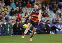“Needs to be explained”: The missing aspect of Adelaide recruit’s development that ensured AFL drafting ADELAIDE, AUSTRALIA - JUNE 04: Hugo Hall-Kahan of the Crows kicks the ball during the 2026 AFL Round 13 match between the Adelaide Crows and the Geelong Cats at Adelaide Oval on June 4, 2026 in Adelaide, Australia. (Photo by James Elsby/AFL Photos via Getty Images)
