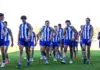 BUNBURY, AUSTRALIA - JUNE 06: North Melbourne exit the field during the 2026 AFL Round 13 match between the North Melbourne Kangaroos and the Fremantle Dockers at Hands Oval on June 6, 2026 in Bunbury, Australia. (Photo by Travis Hayto/AFL Photos via Getty Images)