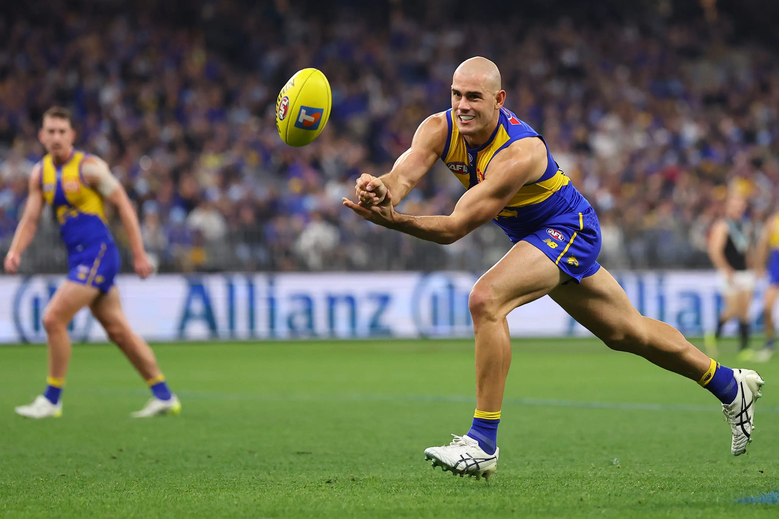 PERTH, AUSTRALIA - JUNE 06: Brandon Starcevich of the Eagles handballs during the round 13 AFL match between West Coast Eagles and Port Adelaide Power at Optus Stadium, on June 06, 2026, in Perth, Australia. (Photo by Paul Kane/Getty Images)