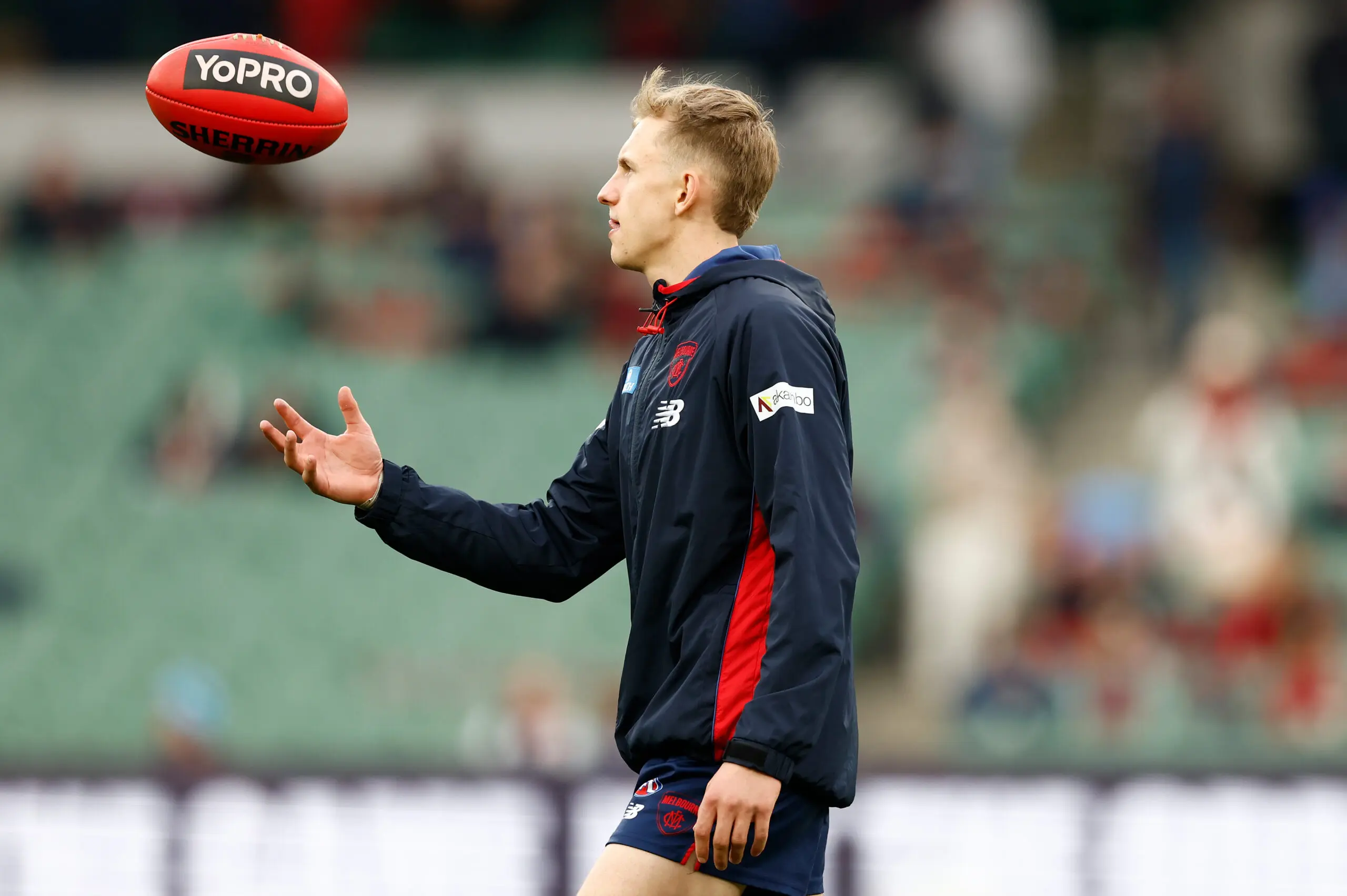 MELBOURNE, AUSTRALIA - JUNE 13: Debutant, Lukas Cooke of the Demons warms up during the 2026 AFL Round 14 match between the Melbourne Demons and the Essendon Bombers at the Melbourne Cricket Ground on June 13, 2026 in Melbourne, Australia. (Photo by Michael Willson/AFL Photos via Getty Images)