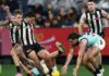 MELBOURNE, AUSTRALIA - JUNE 20: Lachie Schultz of the Magpies gives away a kicking in danger free to Lachie Jones of the Power during the 2026 AFL Round 15 match between the Collingwood Magpies and the Port Adelaide Power at the Melbourne Cricket Ground on June 20, 2026 in Melbourne, Australia. (Photo by James Wiltshire/AFL Photos via Getty Images)