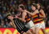 ADELAIDE, AUSTRALIA - JUNE 27: Tempers flare between Mitch Georgiades of the Power and Max Michalanney of the Crows during the 2026 AFL Round 16 match between the Port Adelaide Power and the Adelaide Crows at Adelaide Oval on June 27, 2026 in Adelaide, Australia. (Photo by Sarah Reed/AFL Photos via Getty Images)