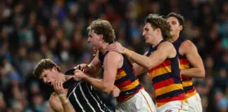 AFL MRO: Key pair cited after fiery Showdown melee ADELAIDE, AUSTRALIA - JUNE 27: Tempers flare between Mitch Georgiades of the Power and Max Michalanney of the Crows during the 2026 AFL Round 16 match between the Port Adelaide Power and the Adelaide Crows at Adelaide Oval on June 27, 2026 in Adelaide, Australia. (Photo by Sarah Reed/AFL Photos via Getty Images)