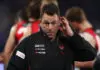 MELBOURNE, AUSTRALIA - JUNE 28: Dean Solomon, Interim Head Coach of the Bombers looks on during the round 16 AFL match between North Melbourne Kangaroos and Essendon Bombers at Marvel Stadium, on June 28, 2026, in Melbourne, Australia. (Photo by Daniel Pockett/Getty Images)