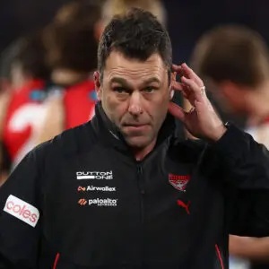 MELBOURNE, AUSTRALIA - JUNE 28: Dean Solomon, Interim Head Coach of the Bombers looks on during the round 16 AFL match between North Melbourne Kangaroos and Essendon Bombers at Marvel Stadium, on June 28, 2026, in Melbourne, Australia. (Photo by Daniel Pockett/Getty Images)