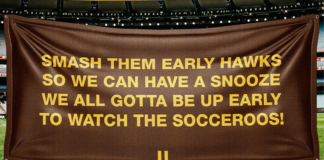 AFL banner man sends Socceroos plea to Hawthorn as Gold Coast channel New York Knicks ban