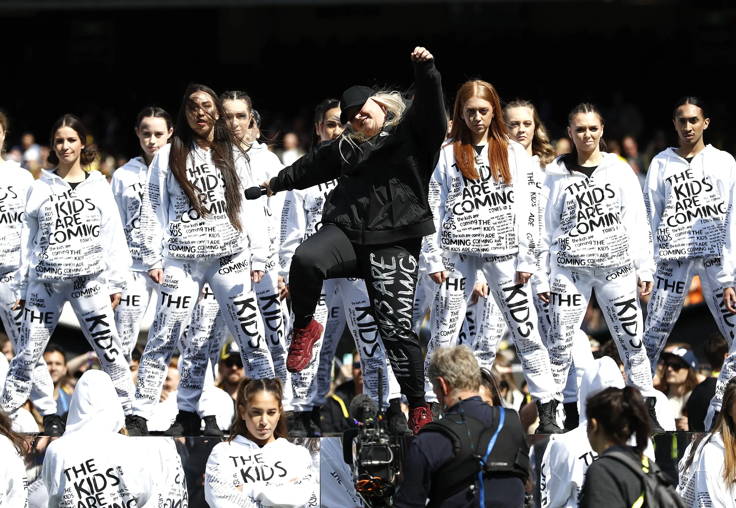 MELBOURNE, AUSTRALIA - SEPTEMBER 28: Tones and I performs during the 2019 AFL Grand Final match between the Richmond Tigers and the Greater Western Sydney Giants at Melbourne Cricket Ground on September 28, 2019 in Melbourne, Australia. (Photo by Ryan Pierse/AFL Medai/via Getty Images )