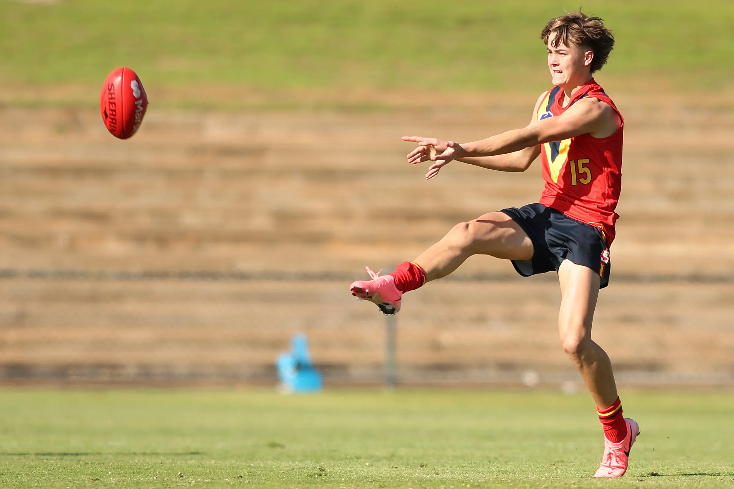 ADELAIDE, AUSTRALIA - JUNE 22: Gus White of South Australia kicks the ball during the Marsh AFL National Development Championships match between U16 Boys South Australia and Western Australia at Thebarton Oval on June 22, 2024 in Adelaide, Australia. (Photo by Maya Thompson/AFL Photos/via Getty Images)