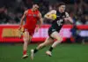 MELBOURNE, AUSTRALIA - AUGUST 09: Blake Acres of the Blues runs with the ball during the round 22 AFL match between Carlton Blues and Gold Coast Suns at Marvel Stadium on August 09, 2025 in Melbourne, Australia. (Photo by Morgan Hancock/Getty Images)