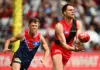 Rival contender emerges for Essendon best-and-fairest winner: AFL trade news ADELAIDE, AUSTRALIA - APRIL 11: Jordan Ridley of the Bombers handballs during the round five AFL match between Essendon Bombers and Melbourne Demons at Adelaide Oval, on April 11, 2026, in Adelaide, Australia. (Photo by Quinn Rooney/Getty Images)
