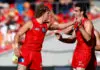 GOLD COAST, AUSTRALIA - APRIL 18: Jed Walter of the Suns celebrates a goal during the 2026 AFL Round 06 match between the Gold Coast Suns and the Essendon Bombers at People First Stadium on April 18, 2026 in the Gold Coast, Australia. (Photo by Russell Freeman/AFL Photos via Getty Images)