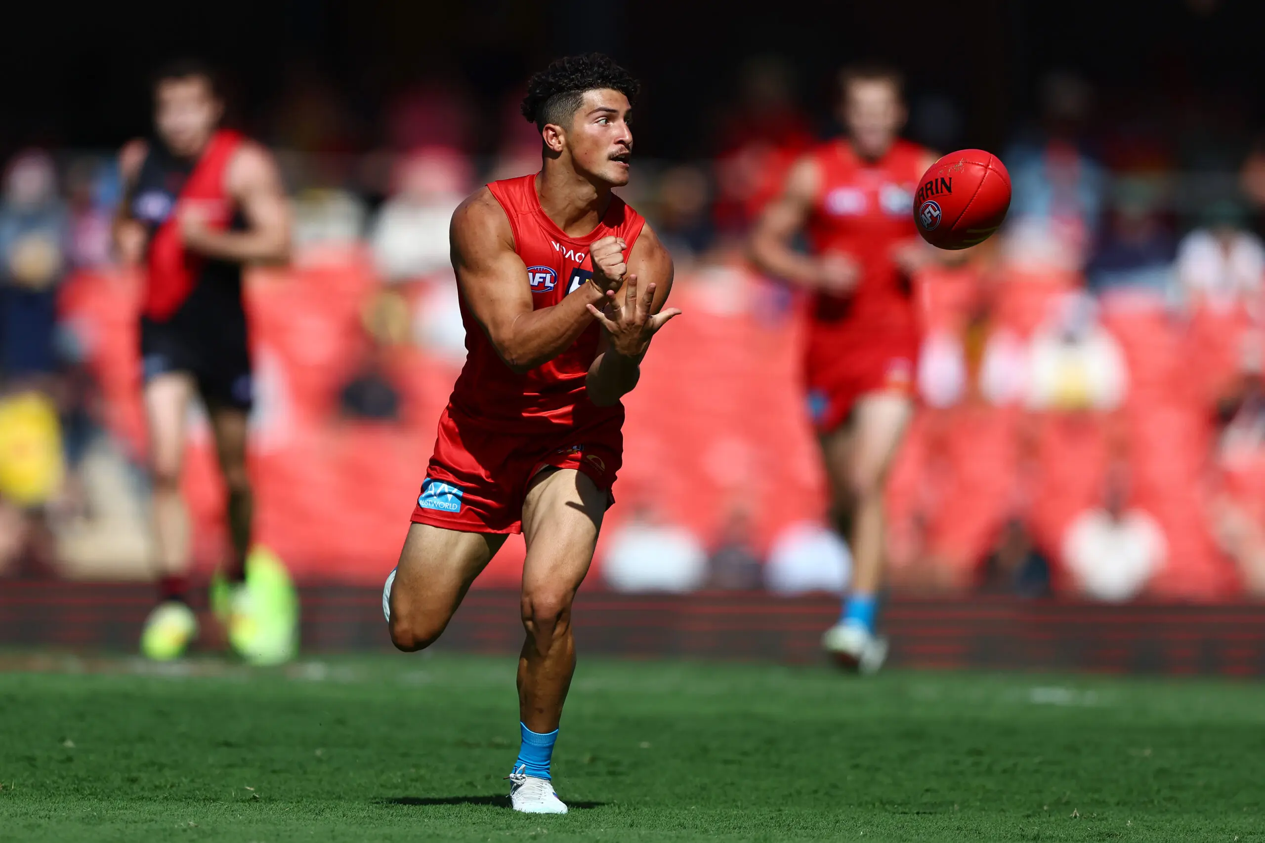 GOLD COAST, AUSTRALIA - APRIL 18: Jake Rogers of the Suns in action during the round six AFL match between Gold Coast Suns and Essendon Bombers at People First Stadium, on April 18, 2026, in Gold Coast, Australia. (Photo by Chris Hyde/Getty Images)